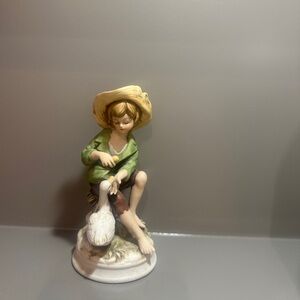 Charming Green and Brown Boy with Goose Figurine
